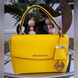 Authentic Michael Kors EUC Ava Extra-Small Saffiano Leather
Crossbody Yellow